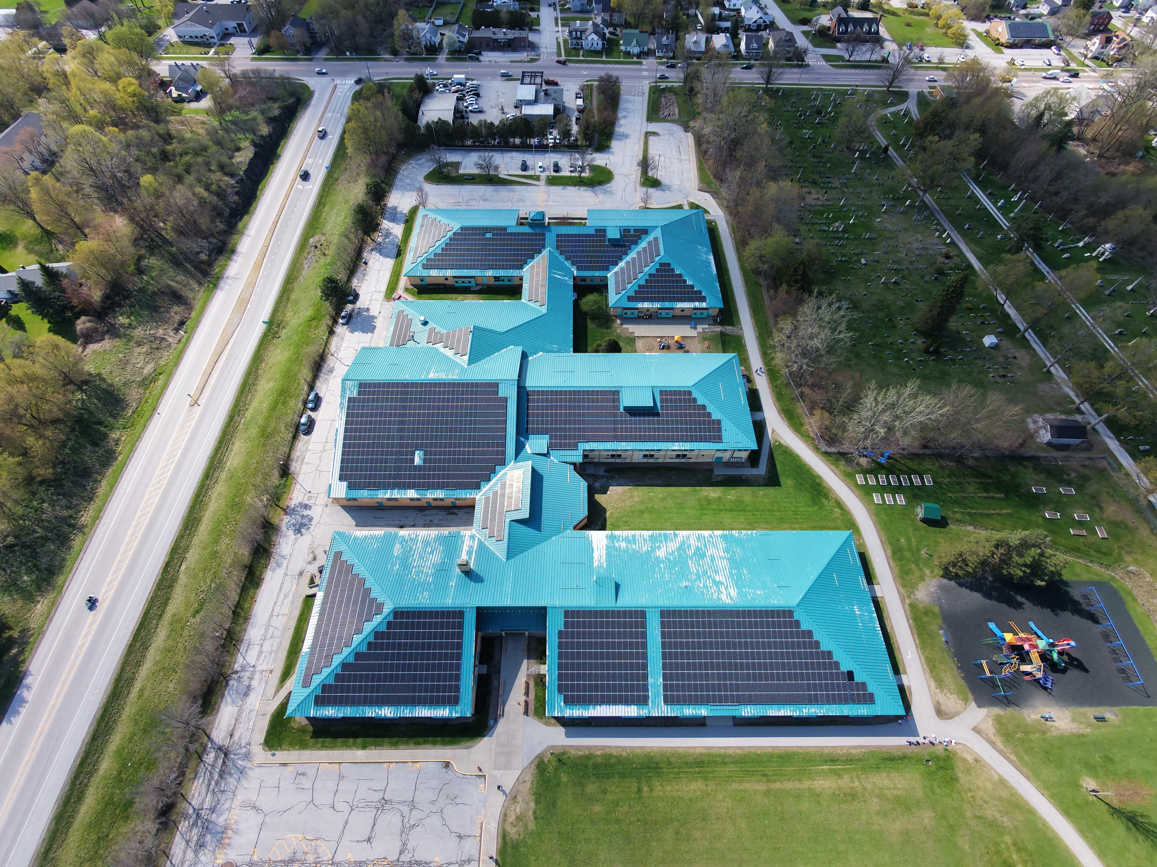 Metal roof coating on Vermont commercial building